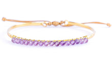 Cargar imagen en el visor de la galería, Pulsera fina bañada en oro con amatista de Bechi Ulivi Jewels.
Thin gold-plated jewelry with amethyst by Bechi Ulivi Jewels.